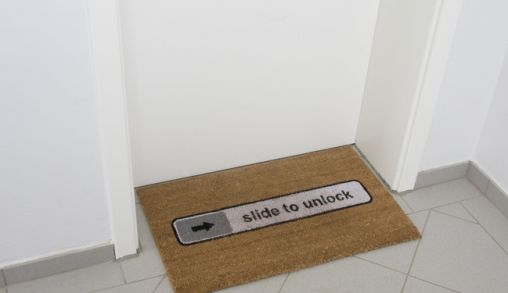 Slide to Unlock deurmat voor de AppleGeek