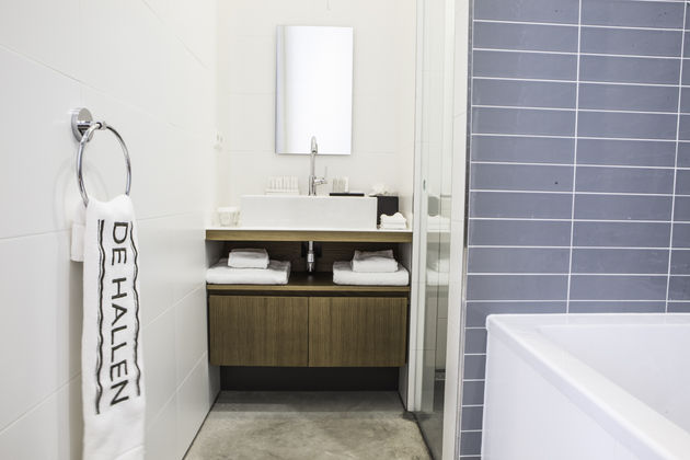 Stijlvolle badkamer in Hotel De Hallen.